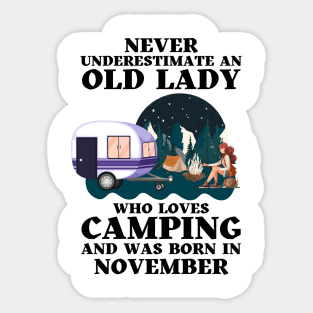 Never Underestimate An Old Lady Who Loves Camping and was born in November Sticker